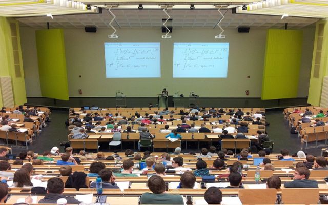 College students lecture hall studying